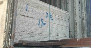 大连 芝麻白花岗岩石材3.0公分光面毛板装柜出货