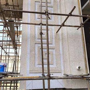 大连 黄金麻花岗岩别墅外墙干挂回纹造型效果