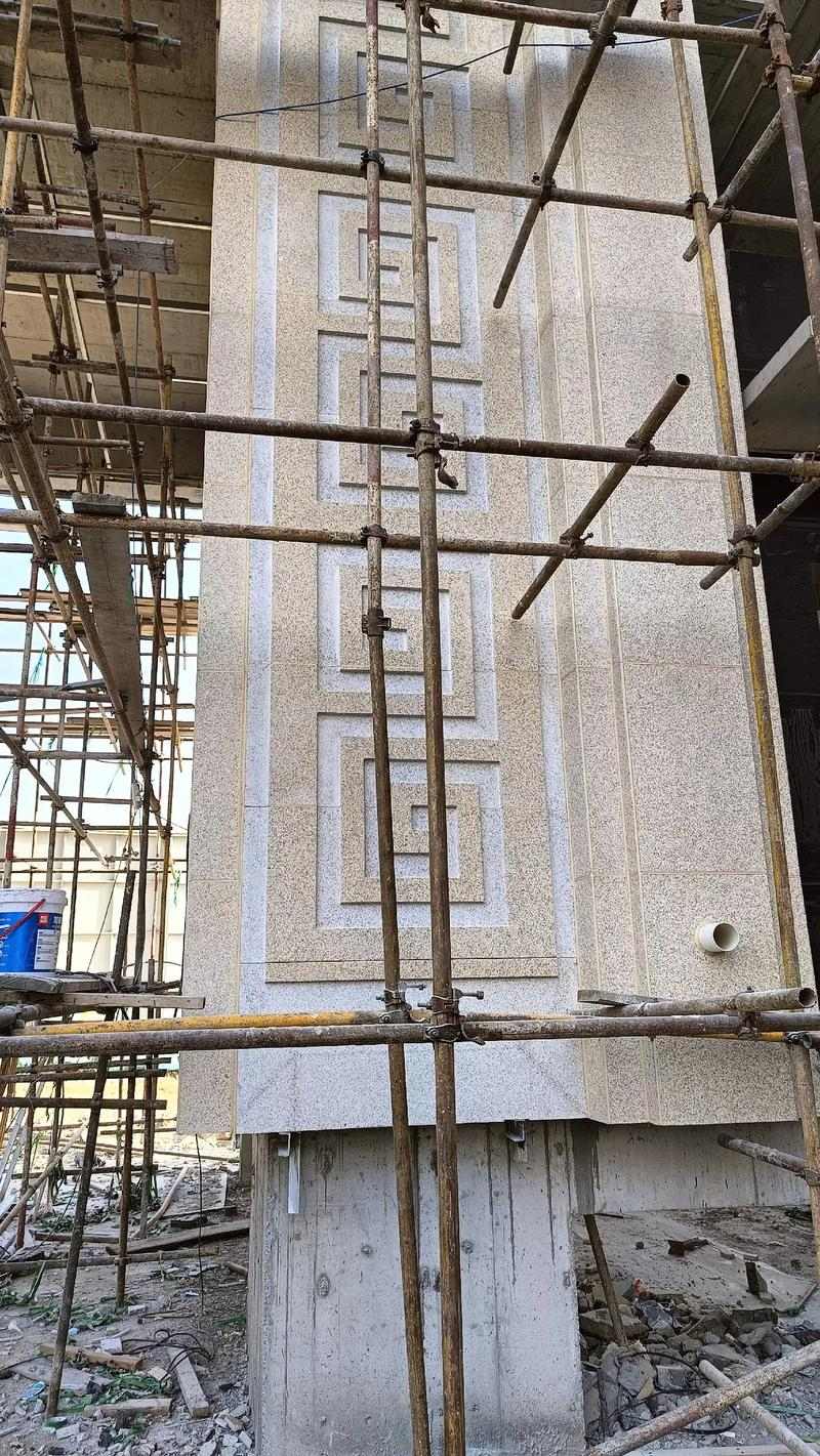 大连 黄金麻花岗岩别墅外墙干挂回纹造型效果