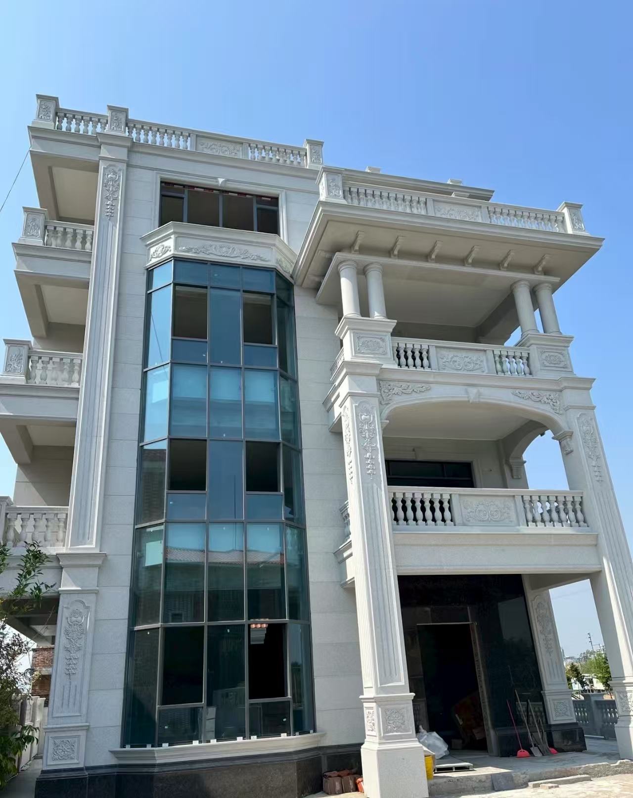 大连 白麻花岗岩别墅外墙干挂效果展示