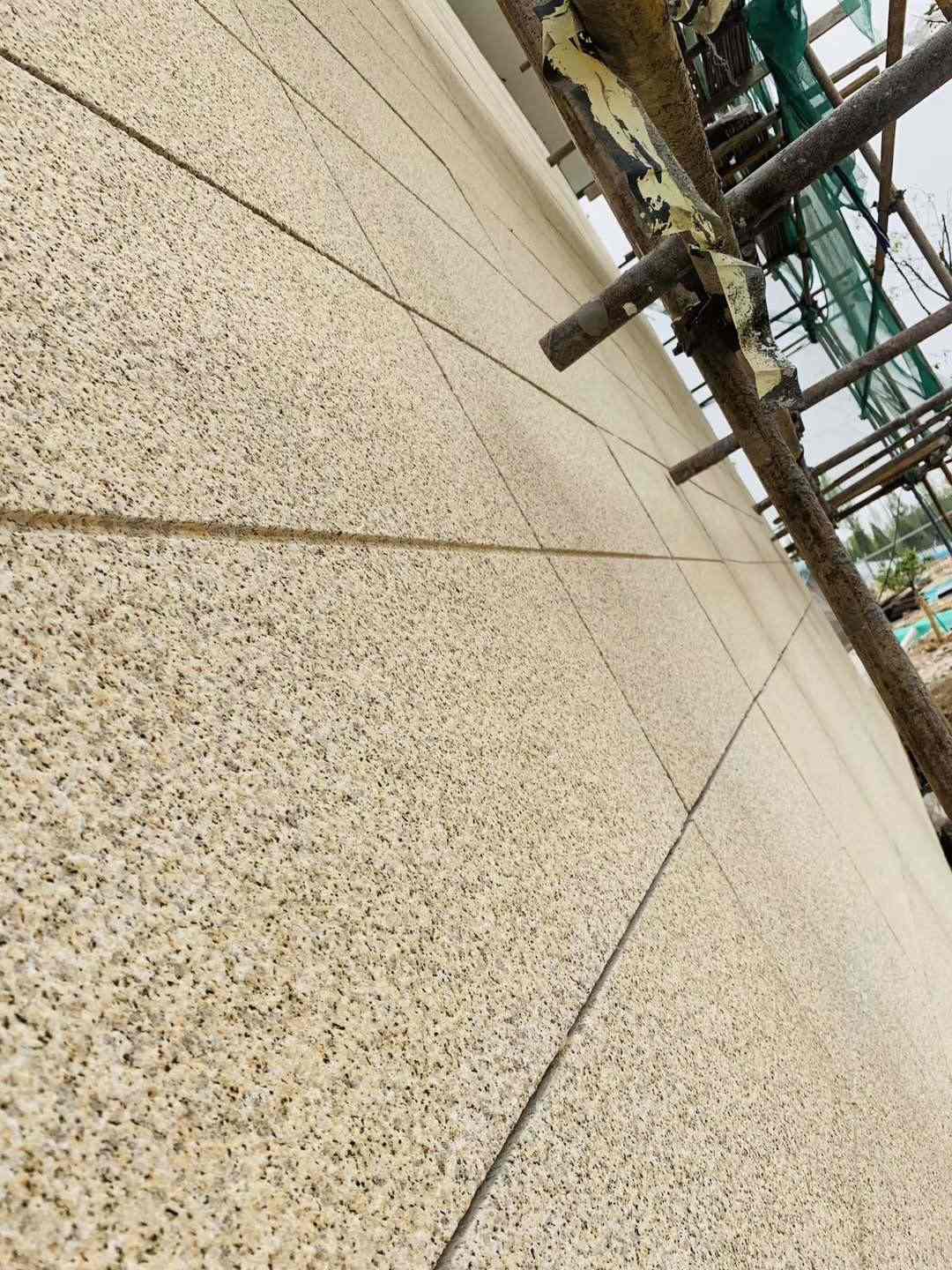 大连 黄金麻花岗岩荔枝面外墙干挂石材效果示例