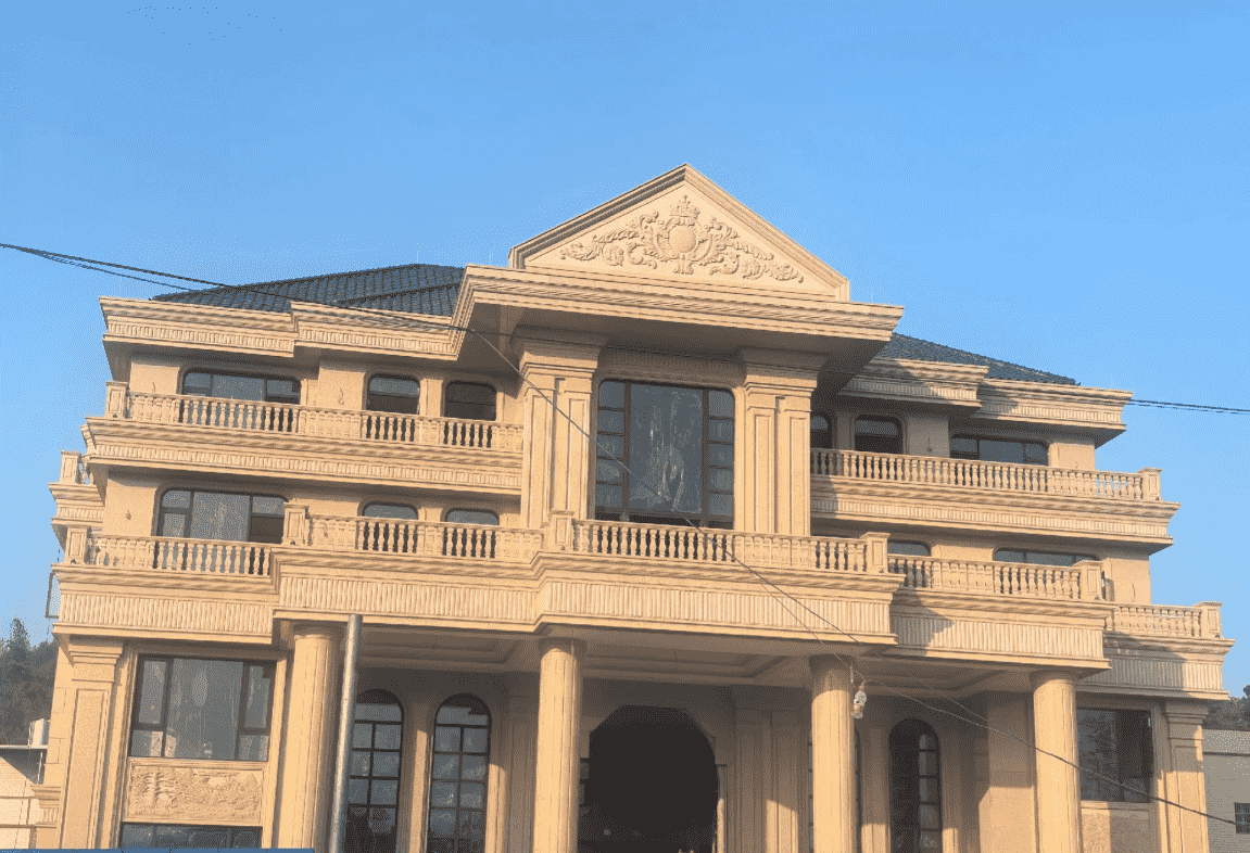 大连黄金麻别墅外墙干挂石材效果示例